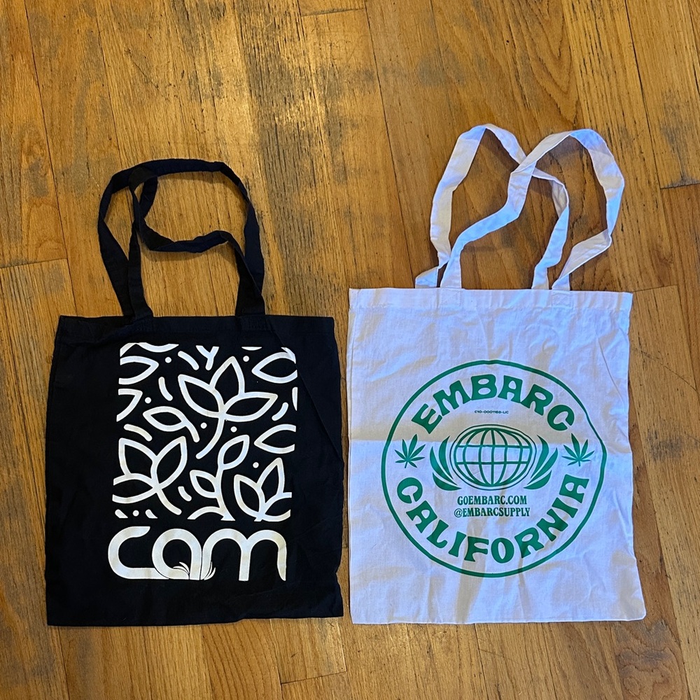 Black CAM and White EMBARC Tote Bag